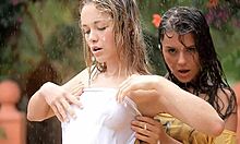 Bestial teen girls are getting their cloths wet under shower outdoors