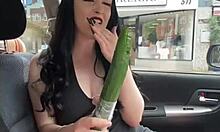 Watch me insert cucumbers into my hairy pussy in public